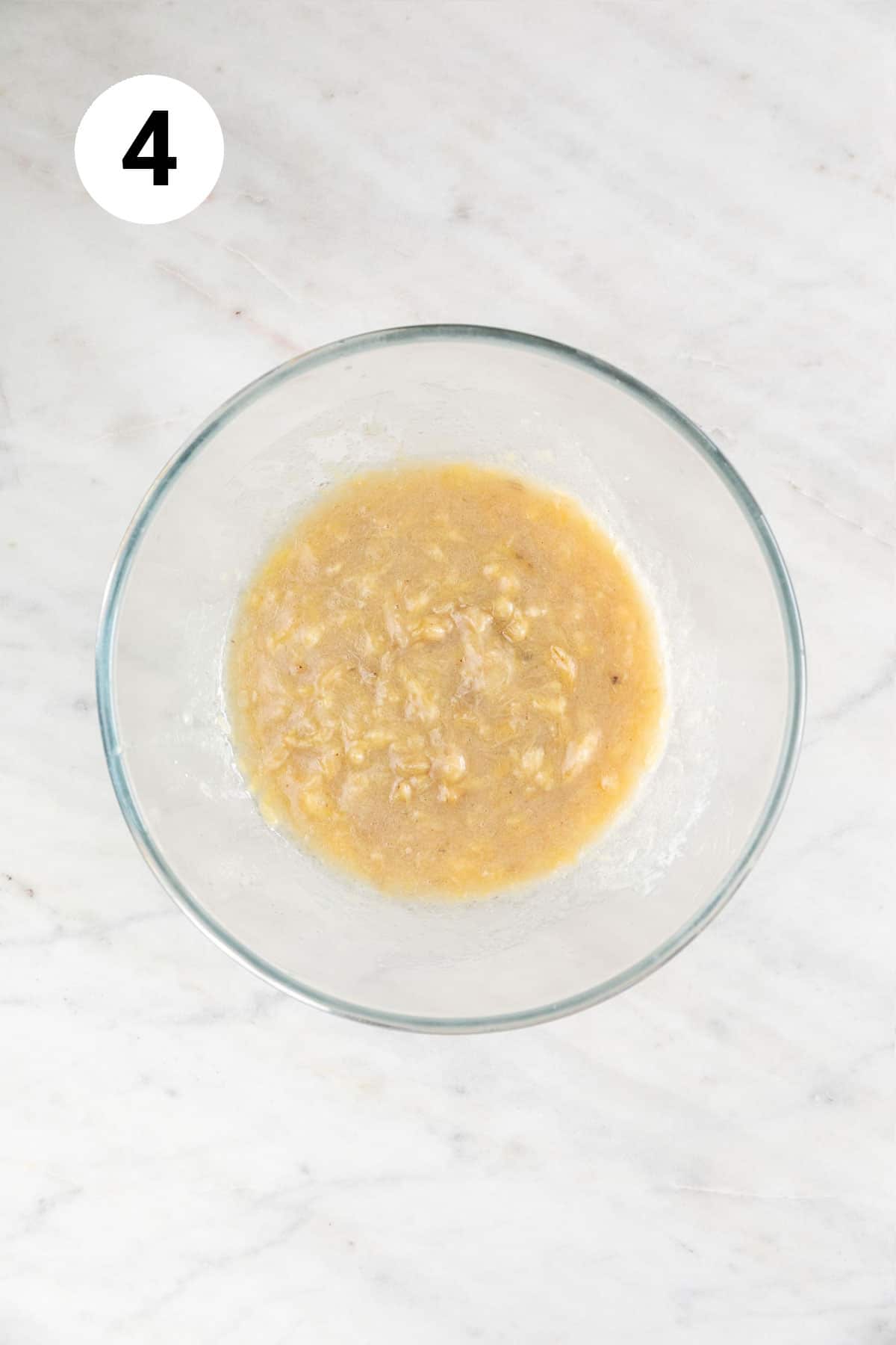 Wet ingredients mixed in a large mixing bowl.