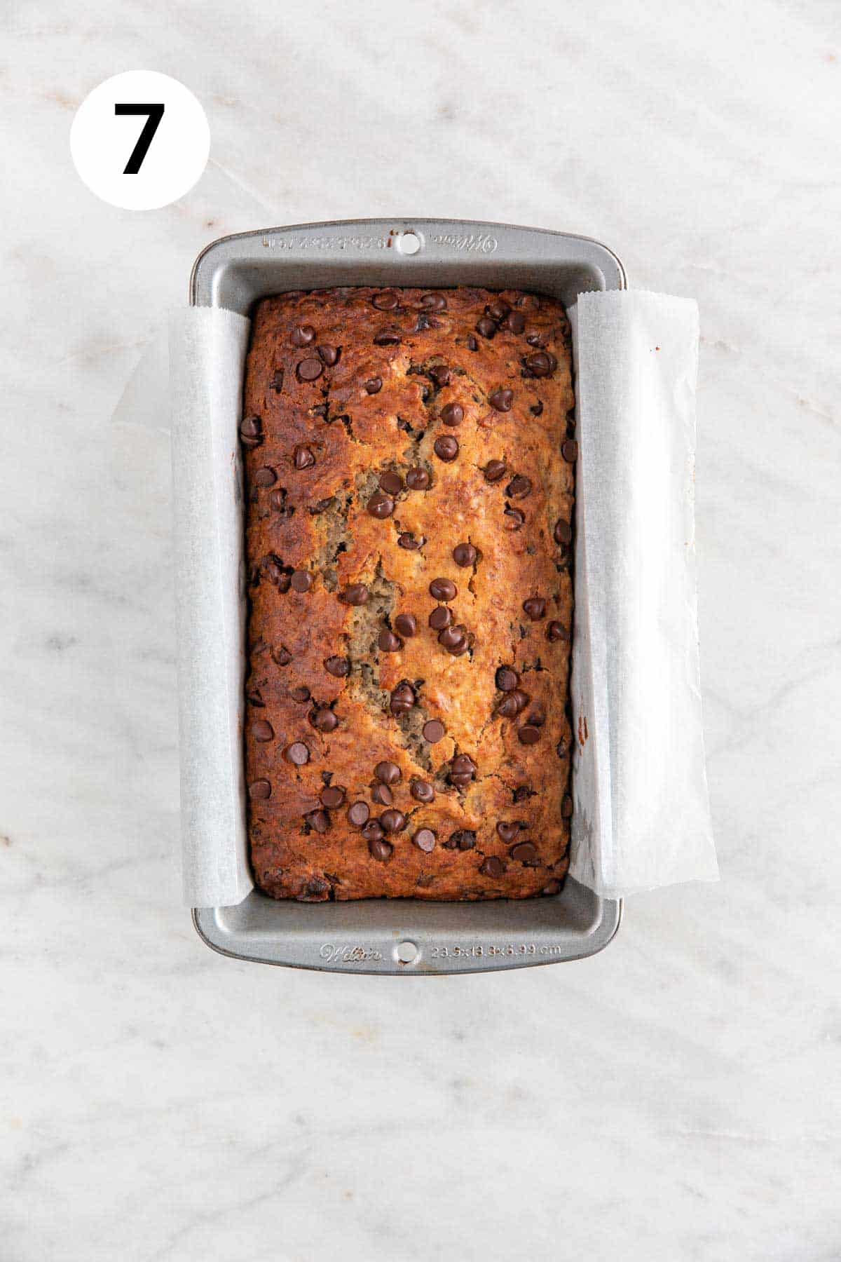 Baked vegan banana bread in a loaf pan.