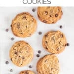 Three vegan chocolate chip cookies stacked up.