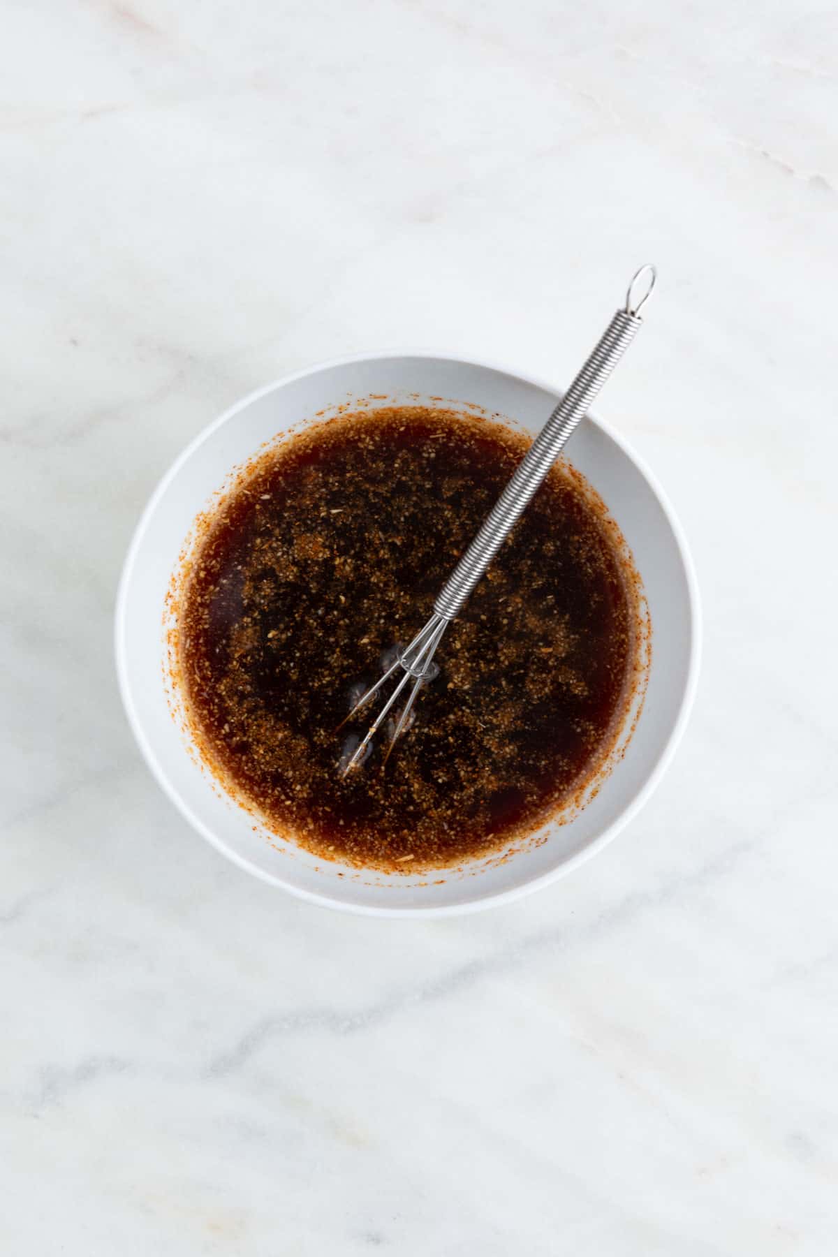 The marinade ingredients mixed in a small bowl.