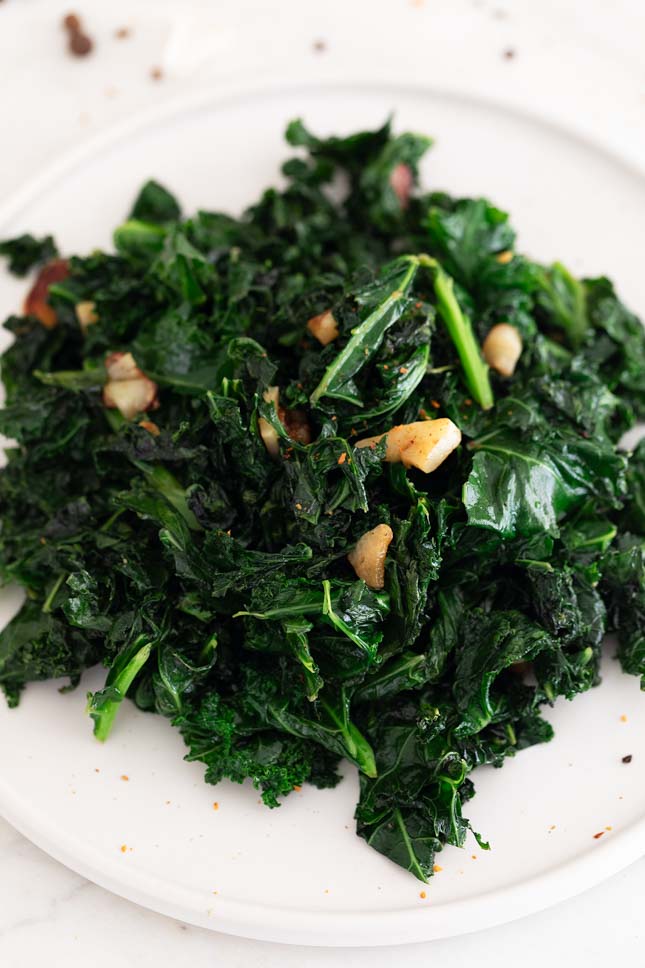 Close-up shot of a plate of sauteed kale