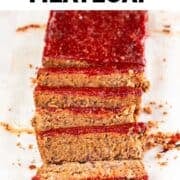 Sliced vegan meatloaf on a white background.