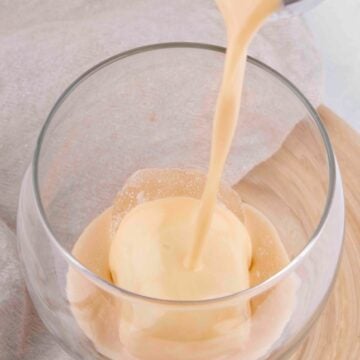 Photo of some vegan Baileys being poured into a glass
