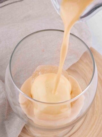 Photo of some vegan Baileys being poured into a glass