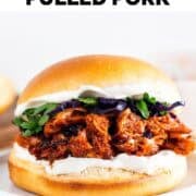 Vegan BBQ jackfruit pulled pork sandwich with vegan mayo and veggies.