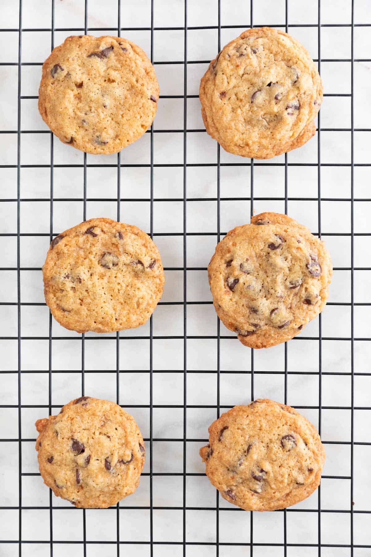 Cookies cooling onto a cooling rack.