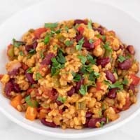 A square picture of a dish of vegan jambalaya
