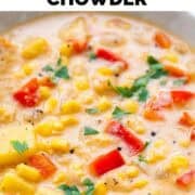 Bowl of vegan potato and corn chowder topped with fresh parsley.