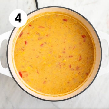 Blended vegan potato and corn chowder in a large pot.