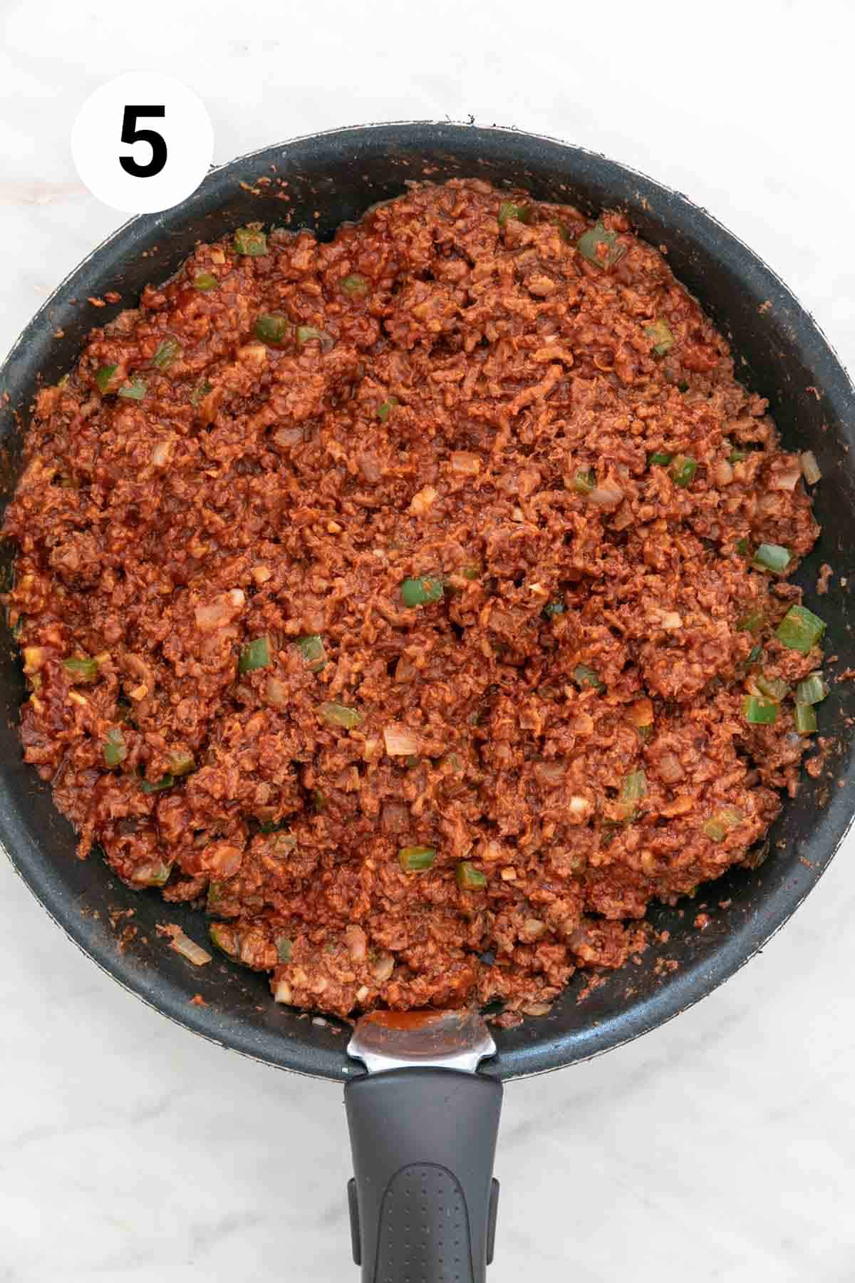 Vegan sloppy joes mixture after cooking in a skillet.