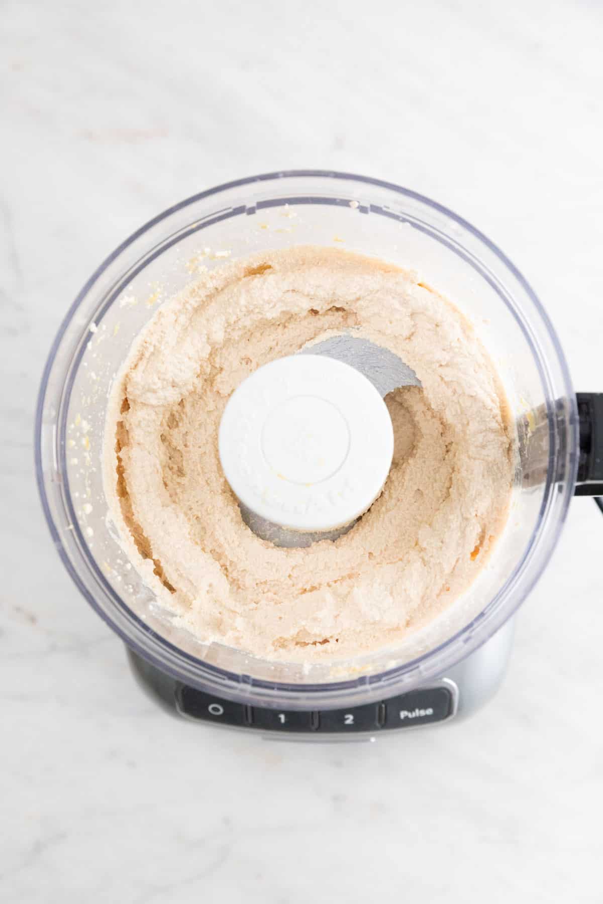 Vegan tofu ricotta cheese in a food processor.